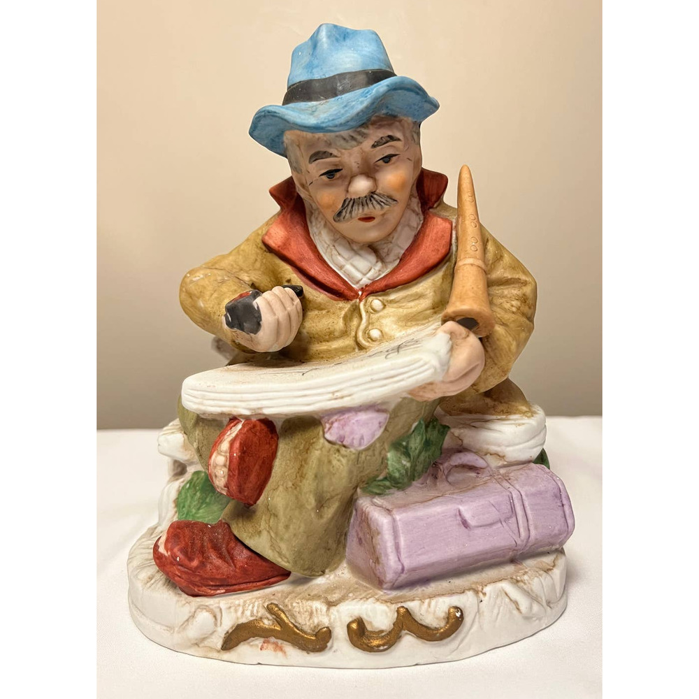 J. J. Crown Hobo looking‎ at music lyrics sitting on a bench 7 1/2" tall